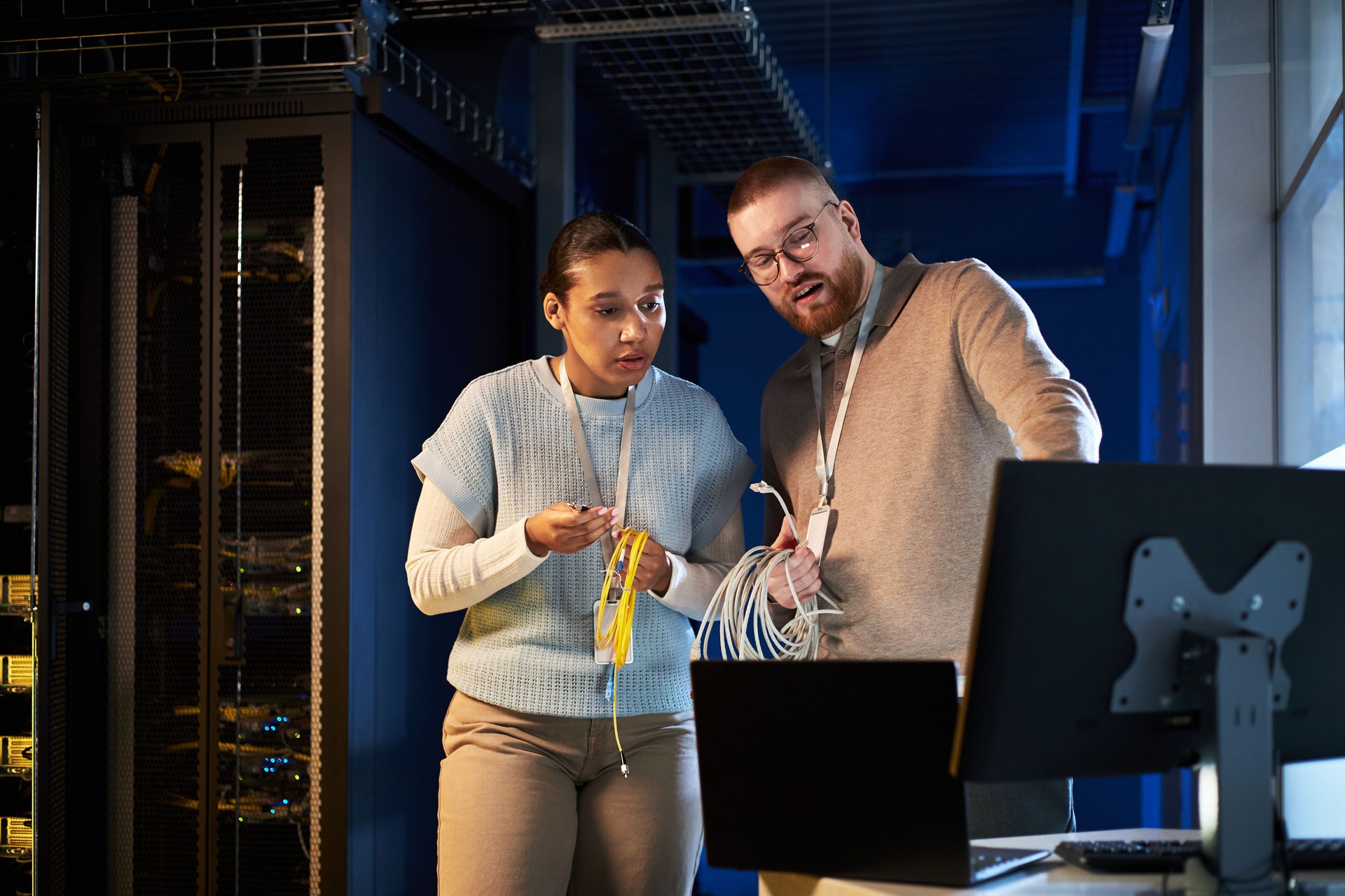 Busy IT Professionals Setting Up Network Infrastructure